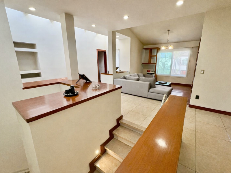 Modern living room with staircase view